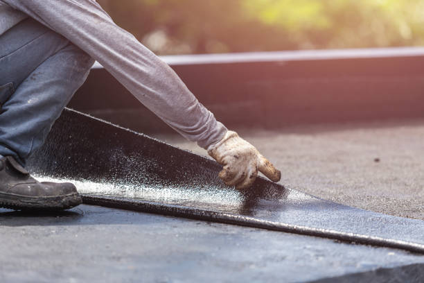 Professional Emergency Waterproofing technician working in Harwood, MD